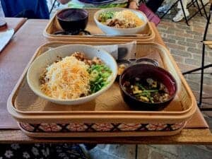 rice dish with broth served in a bamboo basket